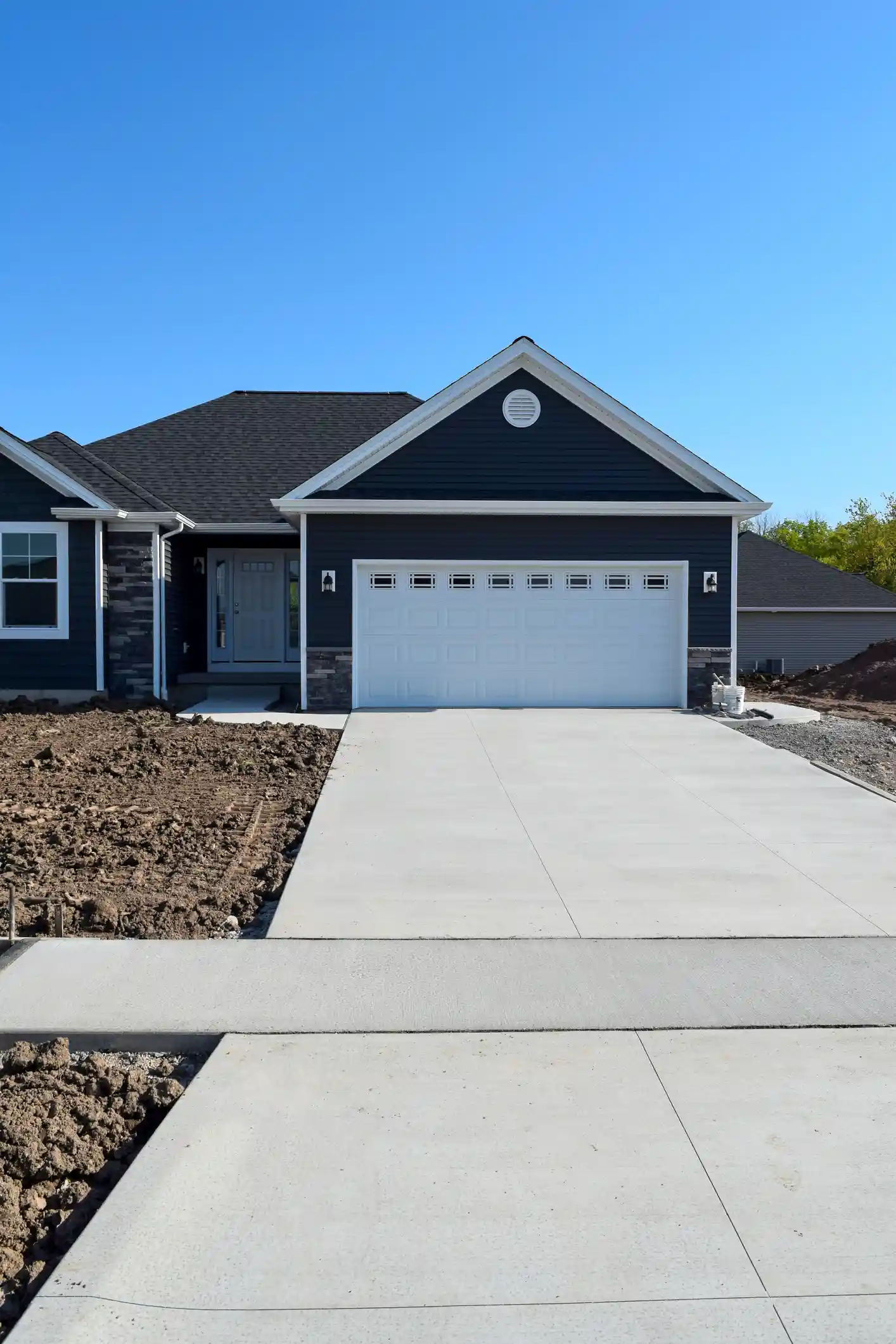 a finished concrete driveway installed in Windsor